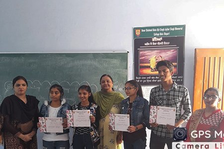 With the winners of Slogan Writing Competition on Guru Nanak Dev’s Teachings